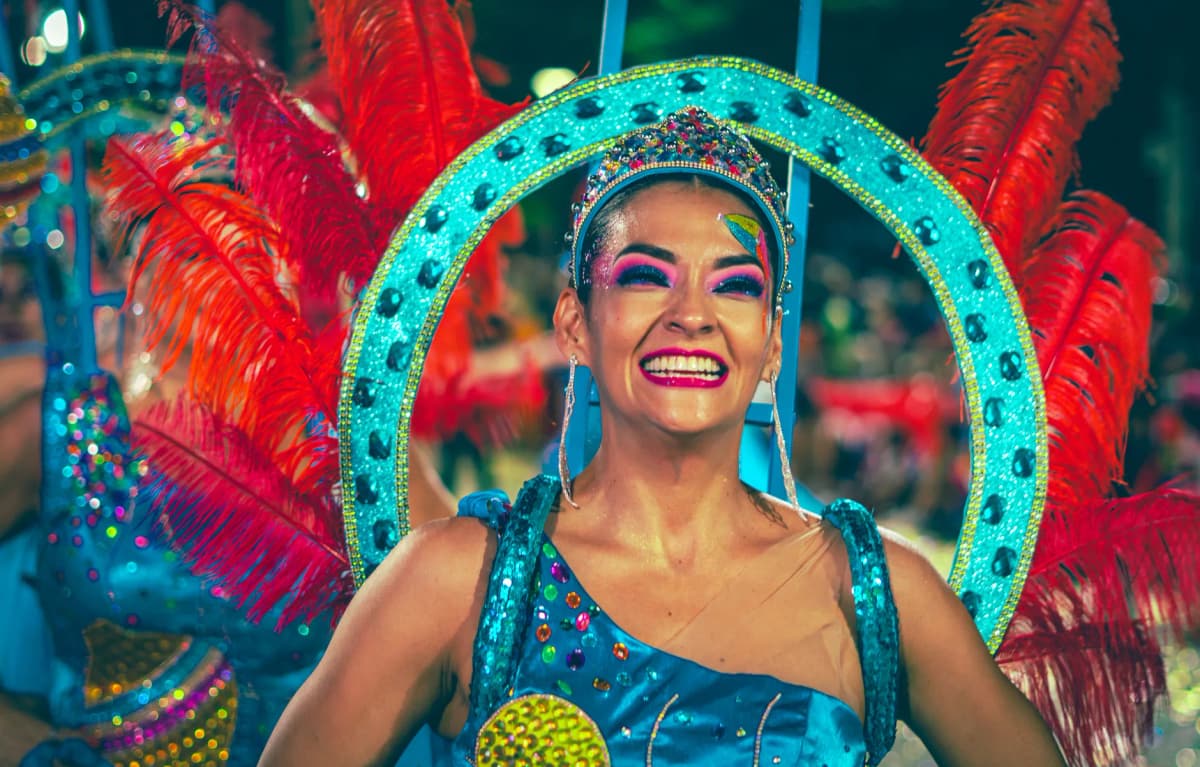 Colorful carnival dancer smiling during a festival in Santa Cruz, Bolivia.